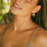 Cascade Cross Necklace